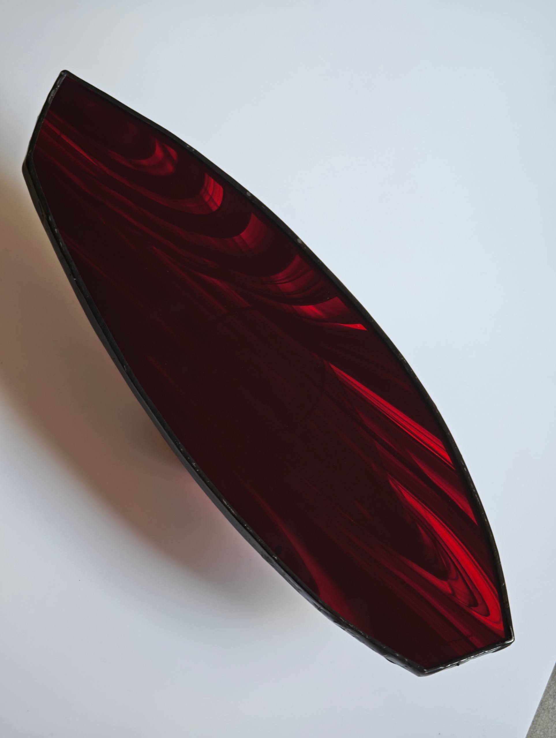 Deep red swirling glass