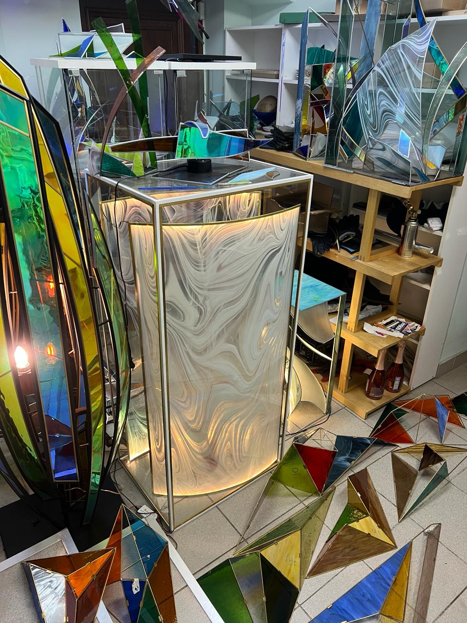 Glass podium and sculptures in the studio